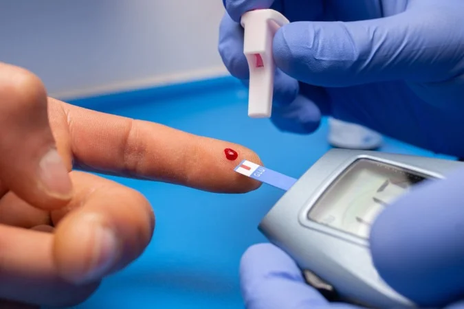 1_closeup-shot-doctor-with-rubber-gloves-taking-blood-test-from-patient-67124444