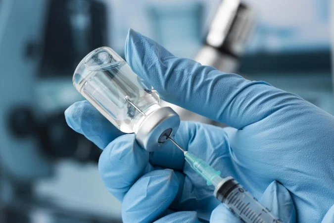 1_covid-still-life-with-vaccine-66793805