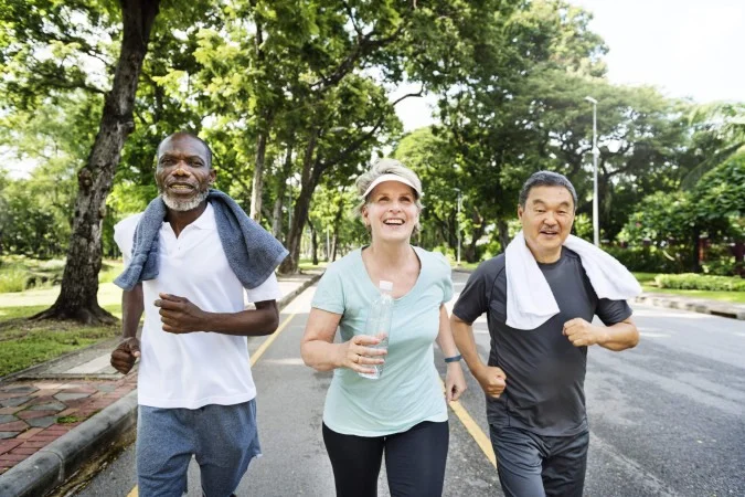 1_group-senior-friends-jogging-together-park-67173747