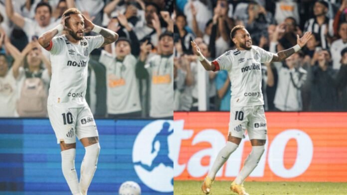 Neymar em jogo do Santos Neymar em campo com uniforme do Santos durante partida da Copa do Brasil