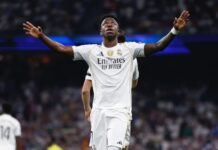 Vini Jr. renova com Real Madrid até 2032 e afasta Arsenal Vinícius Júnior em campo com a camisa do Real Madrid durante partida